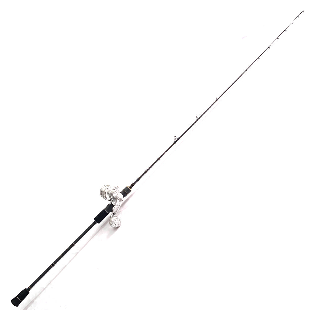Action shot of the Topline Kingsman rod rigged for slow pitch jigging, ready on boat deck for deep-sea fishing