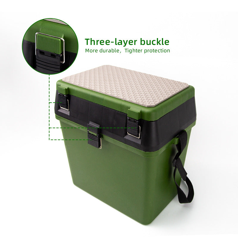 Fisherman carrying the Topline green tackle box through outdoor terrain