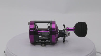 Topline YH001 purple casting reel attached to rod – ideal for jigging, ocean rock, and stream fishing