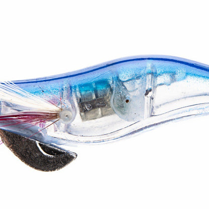 Angler using Topline LED squid jig during a peaceful night fishing trip on a boat